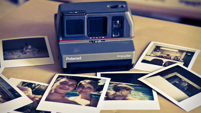 Polaroids and a polaroid camera