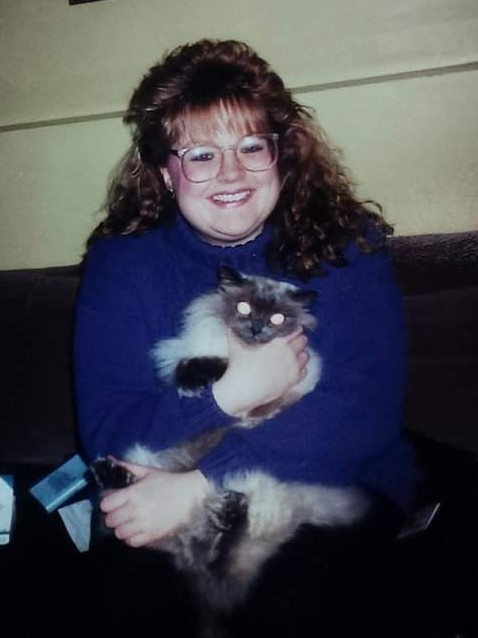 Photo of Erika with a cat