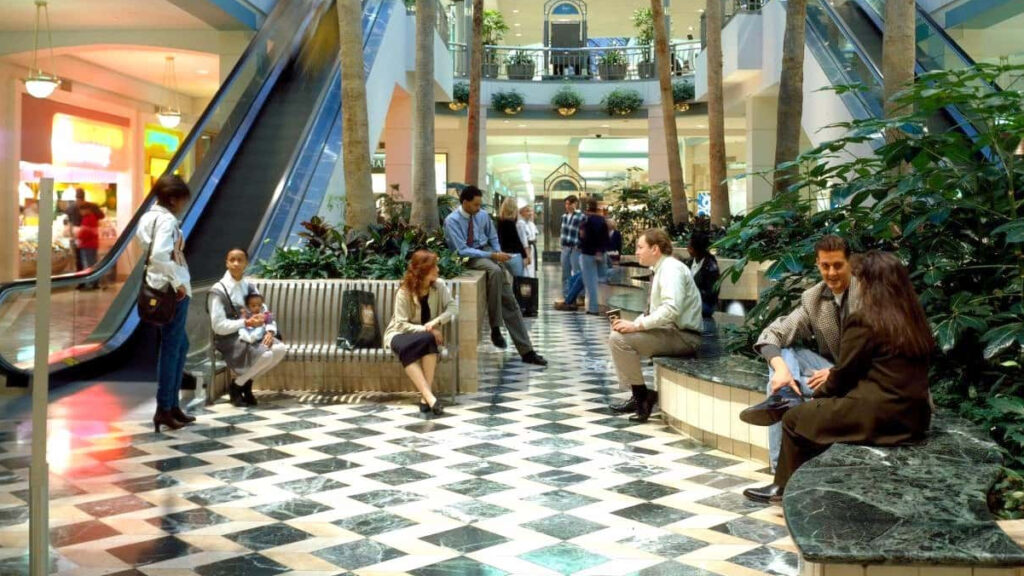 People talking in a mall