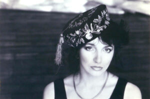 Kate Bush headshot weaing a hat B&W