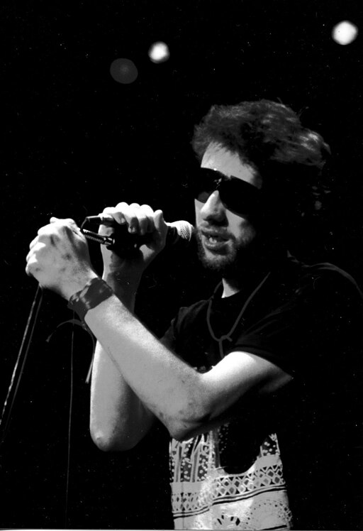 Shane McGowan singing on stage