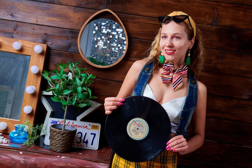 Eclectic woman holding a record
