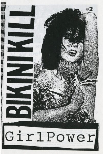 Concert poster with drawing a  drawing of a woman that says Bikini Kill and Girl power. 