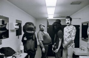 Nirvana - Halloween, 1993: Kurt is dressed as Barney the dinosaur and Pat Smear as Slash