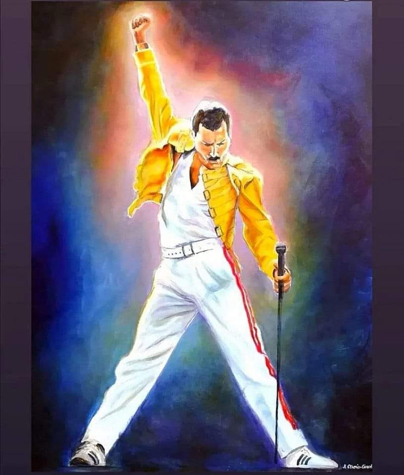 Painting of Freddy Mercury in iconic post wearing white pants, white shirt and yellow jacket. One hand is raised in the air and the other holds a microphone