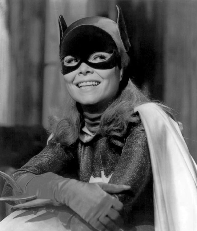 batgirl in black and white smiling