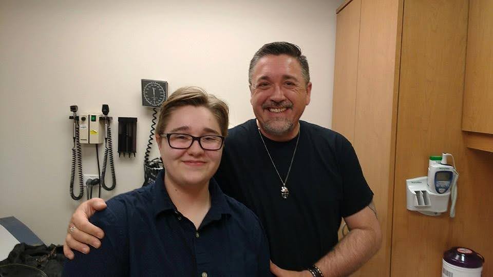 Pat Green and Harvey Green in black shirts with Pat having an arm around harvey in 2016