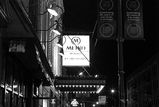 Metro chicago marquis lit up at night in black and white.  