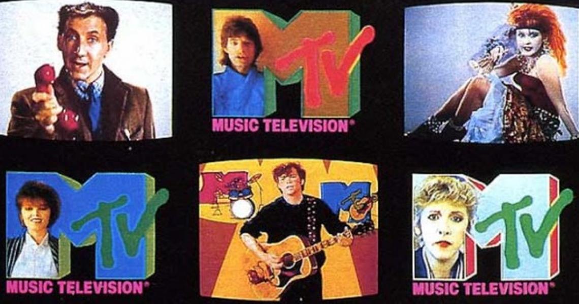 Various rock stars in front of the MTV logo