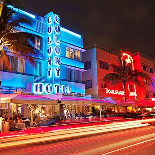 Miami at night with bright lights and exotic neon