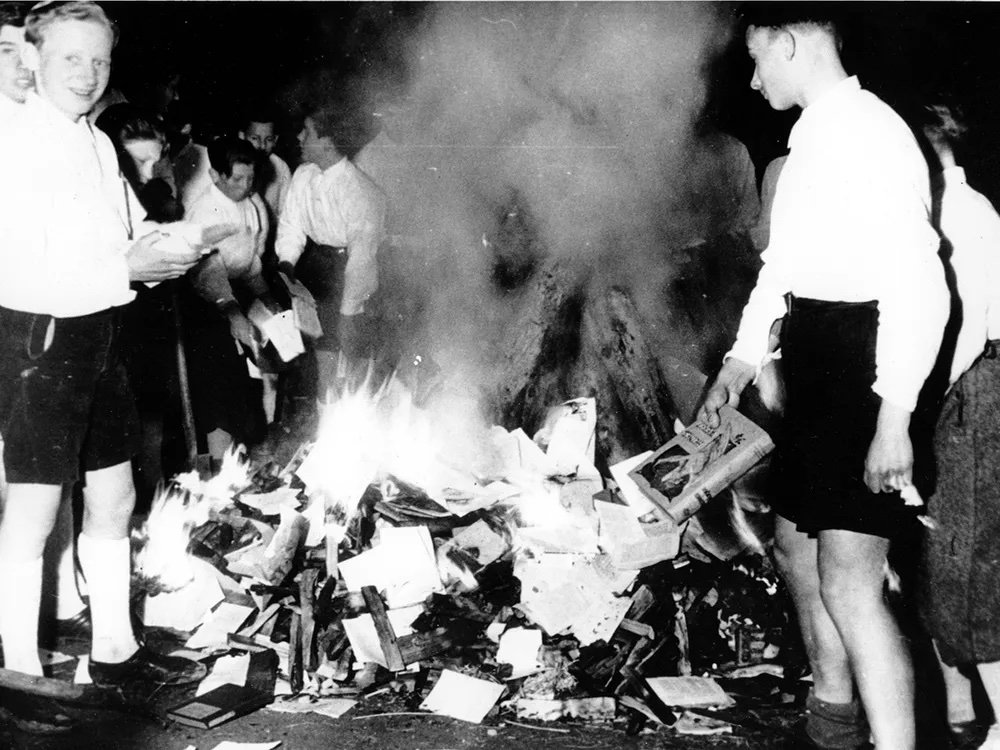 Hitler Youth burning books.