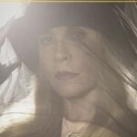 Stevie Nicks in a top hat and black veil