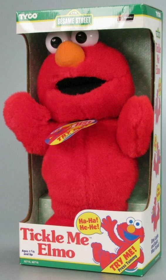 tickle me elmo doll in box