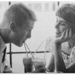 couple in the 1950's having a soda together